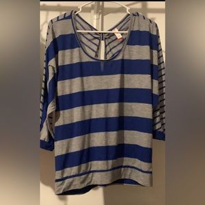 Blue and grey blouse slits in back